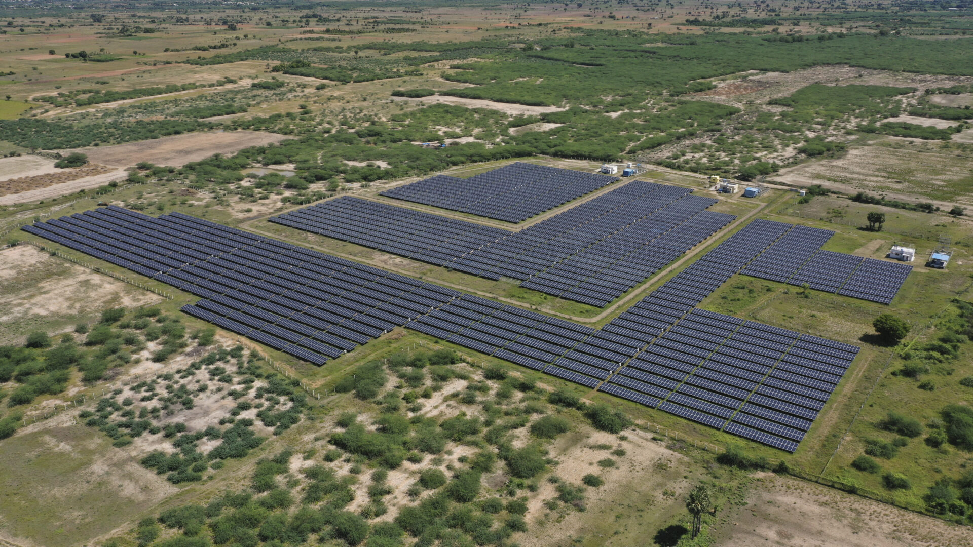 Drone image of solar panels installed at AEDOL industry site.